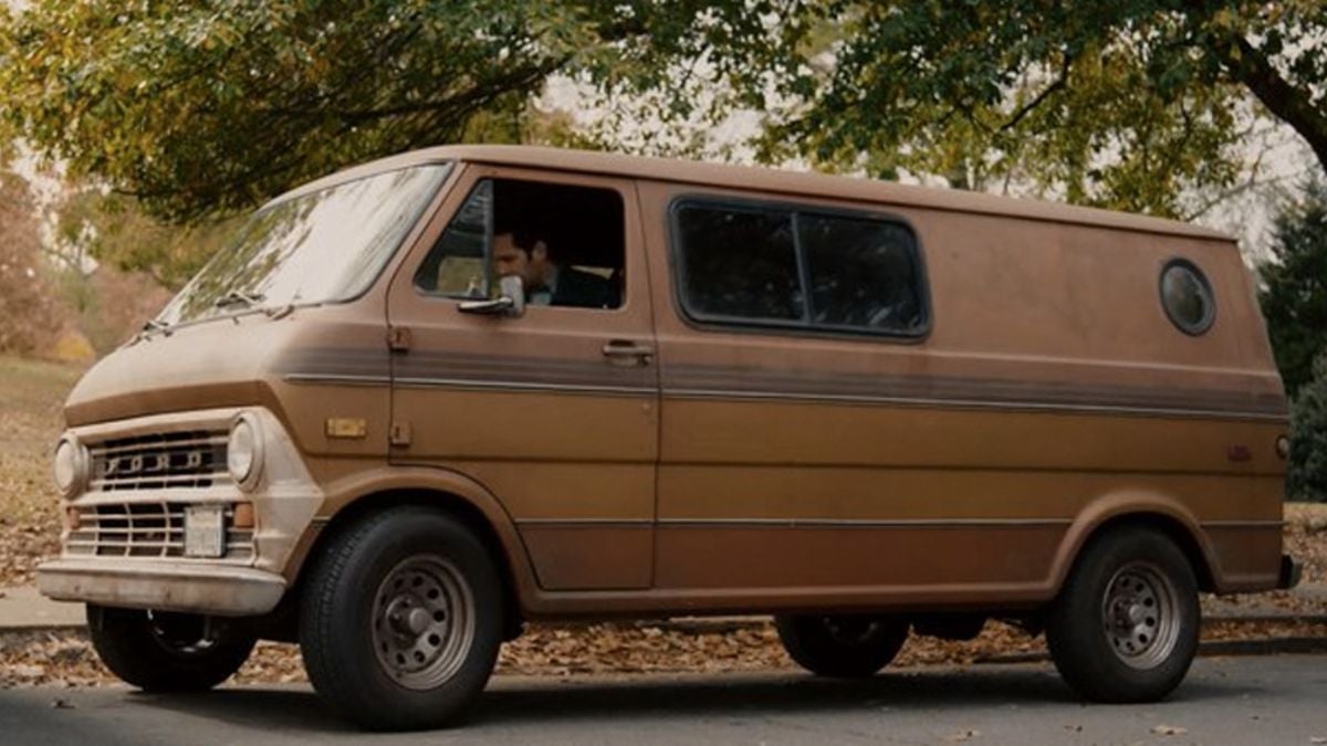 Who says “Anyone see an ugly brown van out there?”?