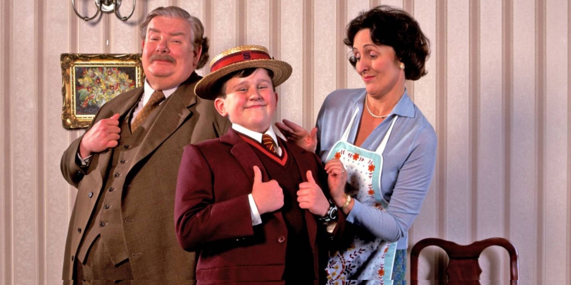 Who do the Dursleys have over for dinner right before the start of Harry’s second year?